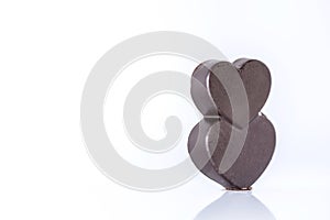 Heart shaped milky chocolate on a white background, close up, isolated, food photography