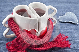 Heart shaped mug with tea