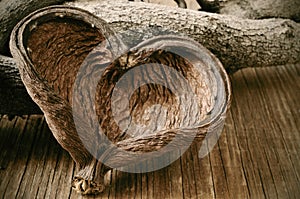 Heart-shaped nut shell and logs