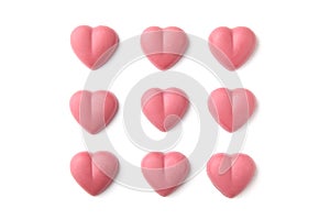 Heart shaped pink ruby chocolate isolated on white background