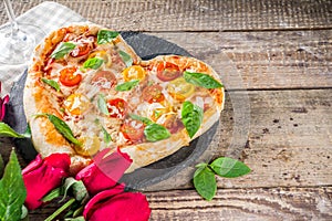 Heart shaped pizza for Valentine day