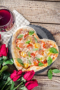 Heart shaped pizza for Valentine day