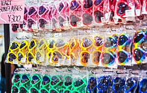 Heart-shaped plastic sunglasses on display in Tokyo