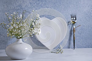 Heart-shaped plate, dinner  holiday  gypsophila flower setting decoration