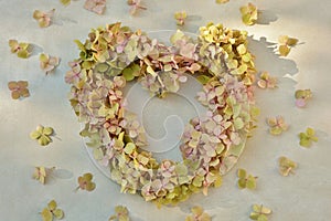 Heart-shaped hydrangea wreath on a light background