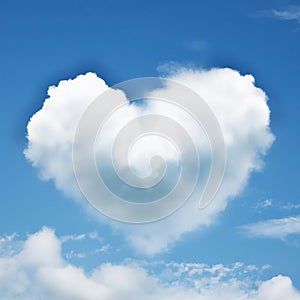 Heart shaped romantic love cloud in blue sky