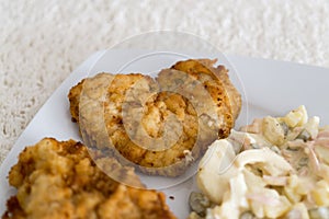 Heart - shaped schnitzel with salad. Slovakia