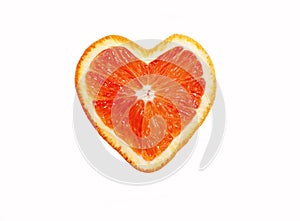 Heart shaped slice of orange on a white background