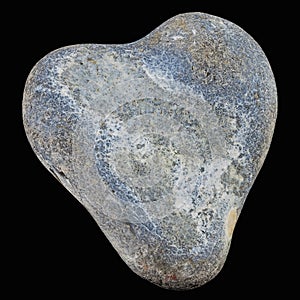 Heart shaped stone on black