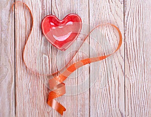 Heart shaped valentine gift with ribbon