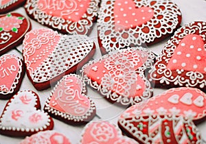 Heart shaped Valentines Day cookies with sugar decorating