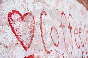 Heart shaped writing on the wall