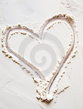 Heart sign on the flour