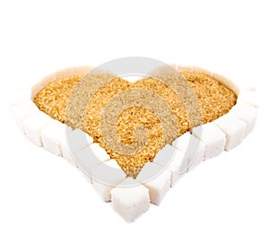 Heart from slices of white refined sugar and brown sugar