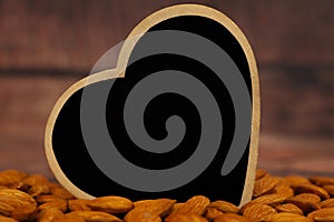 Heart symbol with almonds.