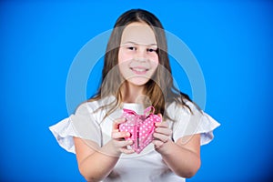 Heart symbol of love. Kid adorable girl happy face show heart blue background. Celebrate valentines day. Love holiday