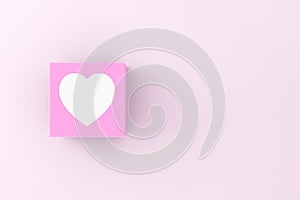 Heart symbol on a pink cube block. Love, relationship and valentine's day concept