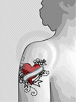 Heart tattooed shoulder