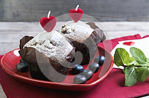 Heart with two berry muffins
