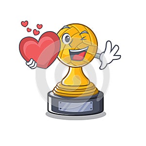 With heart volleyball trophy in the character shape