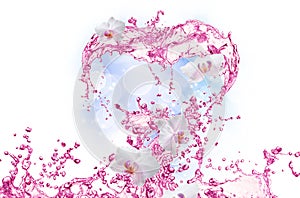 Heart from water splash with bubbles