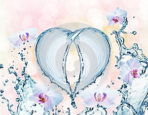 Heart from water splash with bubbles