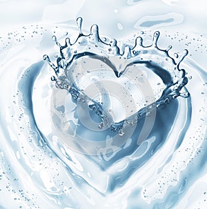 Heart from water splash with bubbles on blue water background