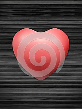 Heart on wooden backfound