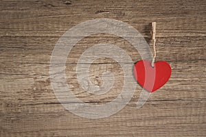 Heart on wooden background