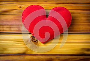 Heart on a wooden table. Valentines Day greeting card