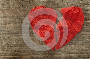 Heartbreak made â€‹â€‹of curled red paper