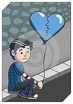 Heartbroken sad young man sitting on the sidewalk