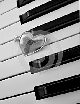 Hearth on piano keyboard music love concept passion art