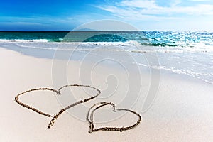 Hearts on beach love concept
