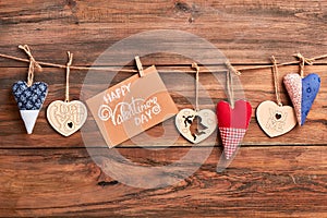 Hearts and card on rope.