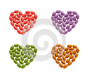 Hearts of coloful pills isolated