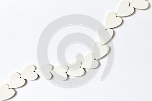 Hearts decoration in the shape of chain with soft shadows.