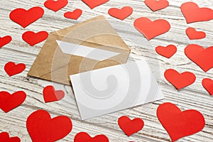 Hearts fly out from the envelope. Love Letter. Background Valentine Day on wooden background