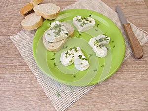 Hearts from fresh cheese with cress sprouts