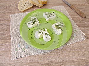 Hearts from fresh cheese with cress sprouts