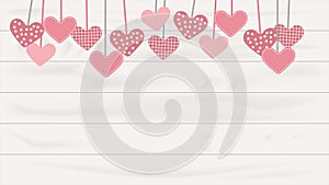 Hearts hanging on the white wooden background. Valentineâ€™s Day concept