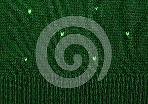 Hearts on knitted wool background