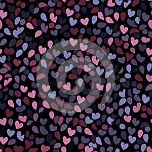 Hearts in purple, red, and gray on a black background (tiled)