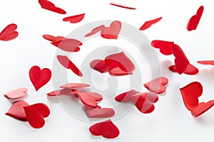 Hearts from red satin, the concept of congratulations for Valentine`s Day and Wedding Day.