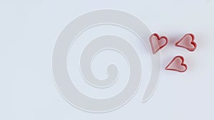 Hearts rotate clockwise on a white background, Valentine's Day and all lovers. Template.