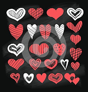 Hearts. Texture white and red chalk decorative symbols on black chalkboard background. Isolated hand drawing doodles