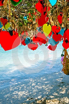 Hearts on the tree on tropical beach of Ko Lan, island near Pattaya, Thailand