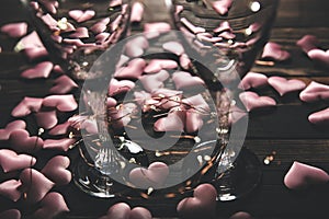 Hearts with wine glasses. Romantics love concept. Festive background. Valentines day postcard. Lights and lamps