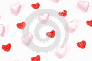Heartshaped candy on white photo