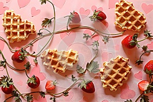 HeartShaped Waffles, Strawberries, and Pink Valentines Decor photo